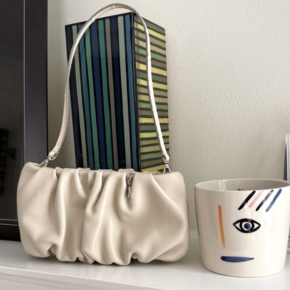 STAUD Handbags - STAUD Leather Convertible Bean Bag Wristlet Clutch in Cream